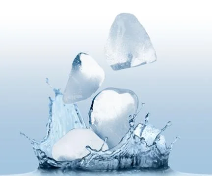 Ice cubes falling into water on light blue gradient background Foto stock