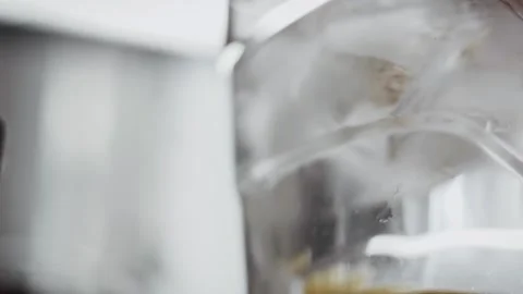 Ice cubes floating in a glass of chilled water, 4K Video stock 341118109