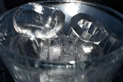 Ice cubes in a glass. Close up. Selective focus. Stock Photos