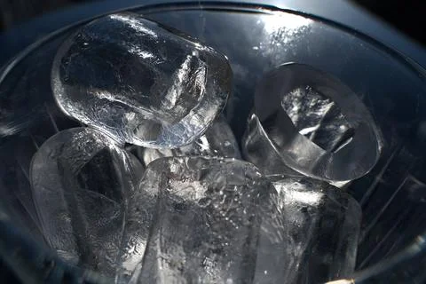 Ice cubes in a glass. Close up. Selective focus. Stock Photos