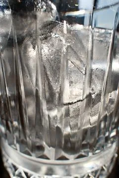 Ice cubes in a glass. Close up. Selective focus. Stock Photos