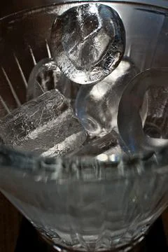 Ice cubes in a glass. Close up. Selective focus. Stock Photos