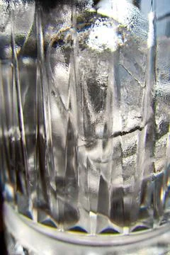 Ice cubes in a glass. Close up. Selective focus. Stock Photos