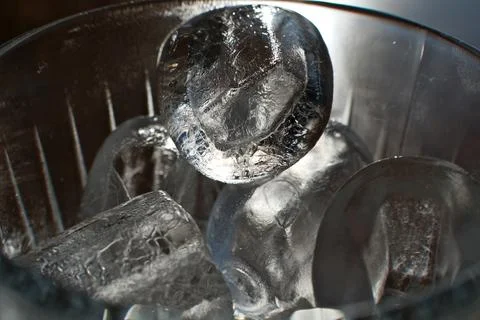 Ice cubes in a glass. Close up. Selective focus. Stock Photos