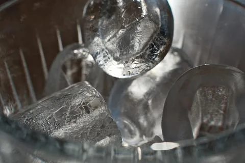 Ice cubes in a glass. Close up. Selective focus. Stock Photos