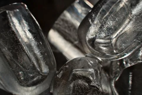 Ice cubes in a glass. Close up. Selective focus. Stock Photos