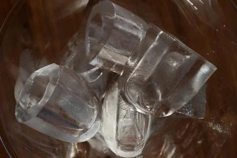 Ice cubes in a glass. Close up. Selective focus. Stock Photos