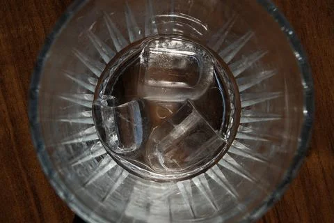 Ice cubes in a glass. Close up. Selective focus. Stock Photos