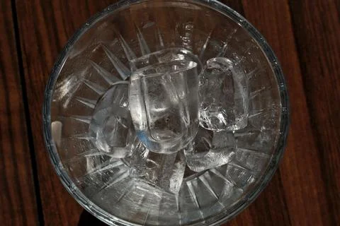 Ice cubes in a glass. Close up. Selective focus. Stock Photos