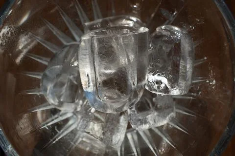 Ice cubes in a glass. Close up. Selective focus. Stock Photos