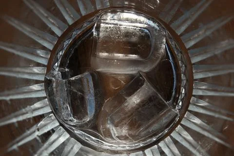Ice cubes in a glass. Close up. Selective focus. Stock Photos