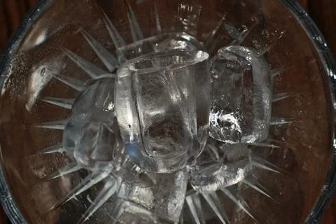 Ice cubes in a glass. Close up. Selective focus. Stock Photos