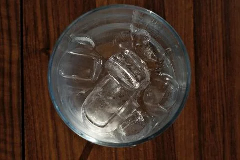 Ice cubes in a glass. Close up. Selective focus. Stock Photos