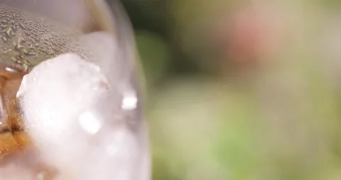 Ice cubes in a glass with cola Stock Footage 133598721