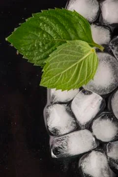 Ice cubes isolated on black Photos