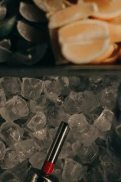 Ice cubes, lime, lemon, pub stuff Stock Photos