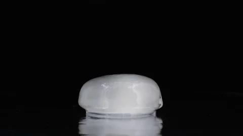 Ice Cubes Melting in Time Lapse Stock Footage 80558654