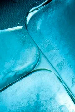 Ice cubes on metallic background Stock Photos
