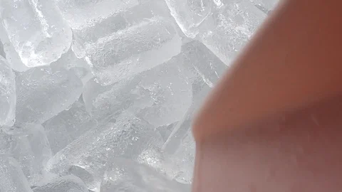 Ice cubes move and mix for refreshing a cool. Stock Footage 90801328