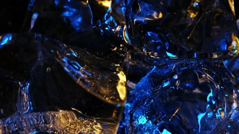 Ice cubes rotate on an axis. 4K color ye... | Stock Video | Pond5
