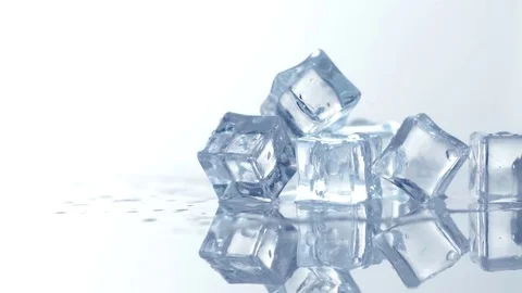 Ice cubes rotation 360 degrees. Closeup ... | Stock Video | Pond5
