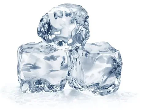 Ice cubes stacked on a white surface with bright background Stock Photos