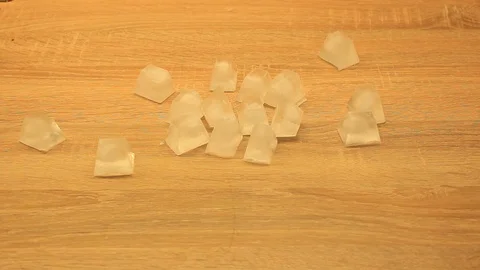 Ice cubes on the table Vídeos de archivo 86572023