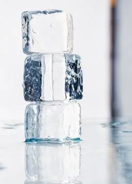Ice cubes on the table Stock Photos