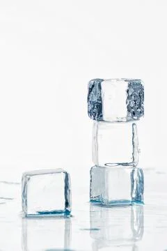 Ice cubes on the table Stock Photos