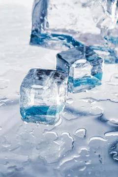 Ice cubes on the table Stock Photos