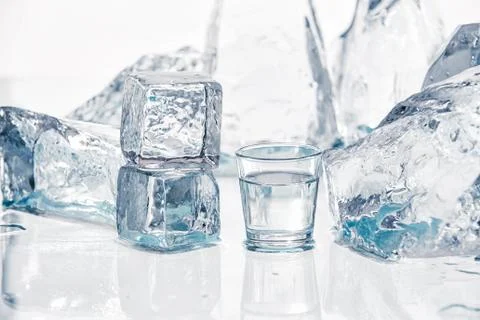 Ice cubes on the table Stock Photos