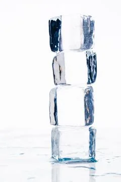 Ice cubes on table Stock Photos