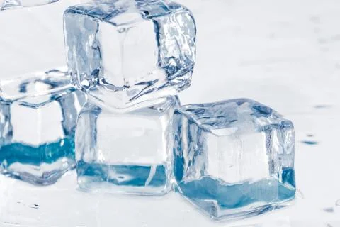Ice cubes on table Stock Photos