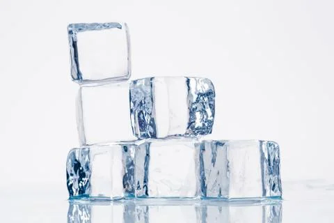 Ice cubes on table Stock Photos