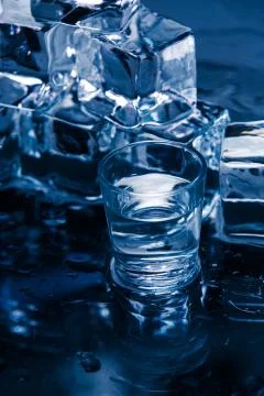 Ice cubes on table Фото