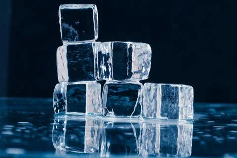 Ice cubes on table Stock Photos
