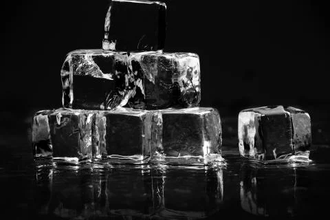 Ice cubes on table Stock Photos