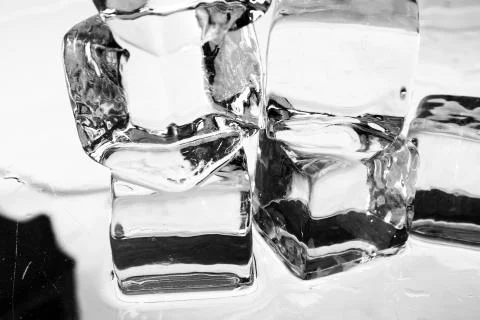 Ice cubes on table Stock Photos
