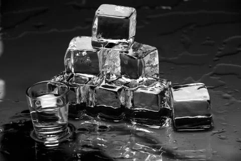 Ice cubes on table Stock Photos