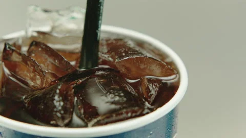 Ice Cubes on top of softdink with bubbles GT07302 Video stock 153813380