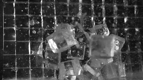 Ice Cubes Wall Break Explosion in Black Background in Slow Motion High Speed Stock Footage 86320353