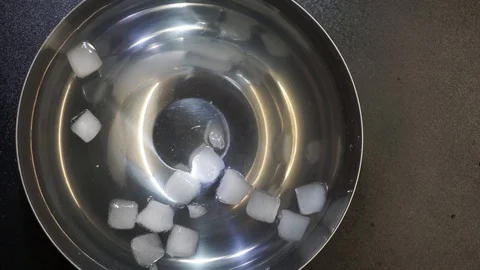 Ice cubes in the water Stock Footage 97410306