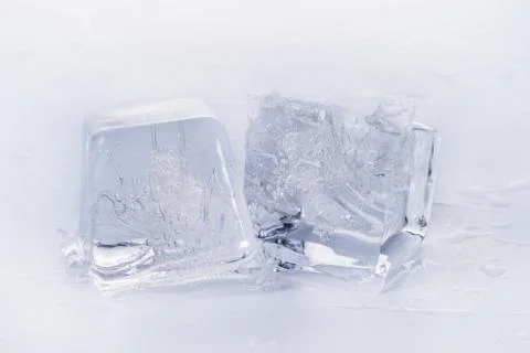 Ice cubes on wet surface Foto stock