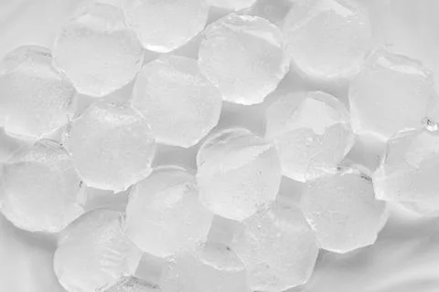 Ice cubes on a white background. File contains clipping path. Stock Photos