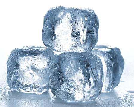Ice cubes on white background. Stock Photos