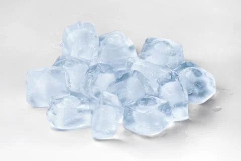 Ice cubes on a white background Stock Photos
