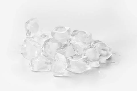 Ice cubes on a white background Stock Photos