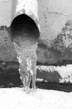 Ice in a drainpipe Stock Photos