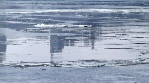 Ice drift and skyscraper reflection. Stock Footage 681103
