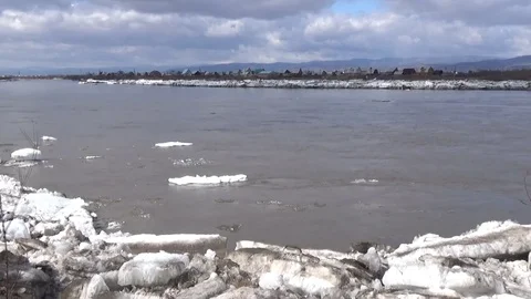 Ice drift in April, ice floes float along the river Stock Footage 75462025